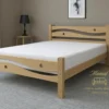 CAMA MADERA URAPAN LATERAL 1 Cama Madera En Flor Morado